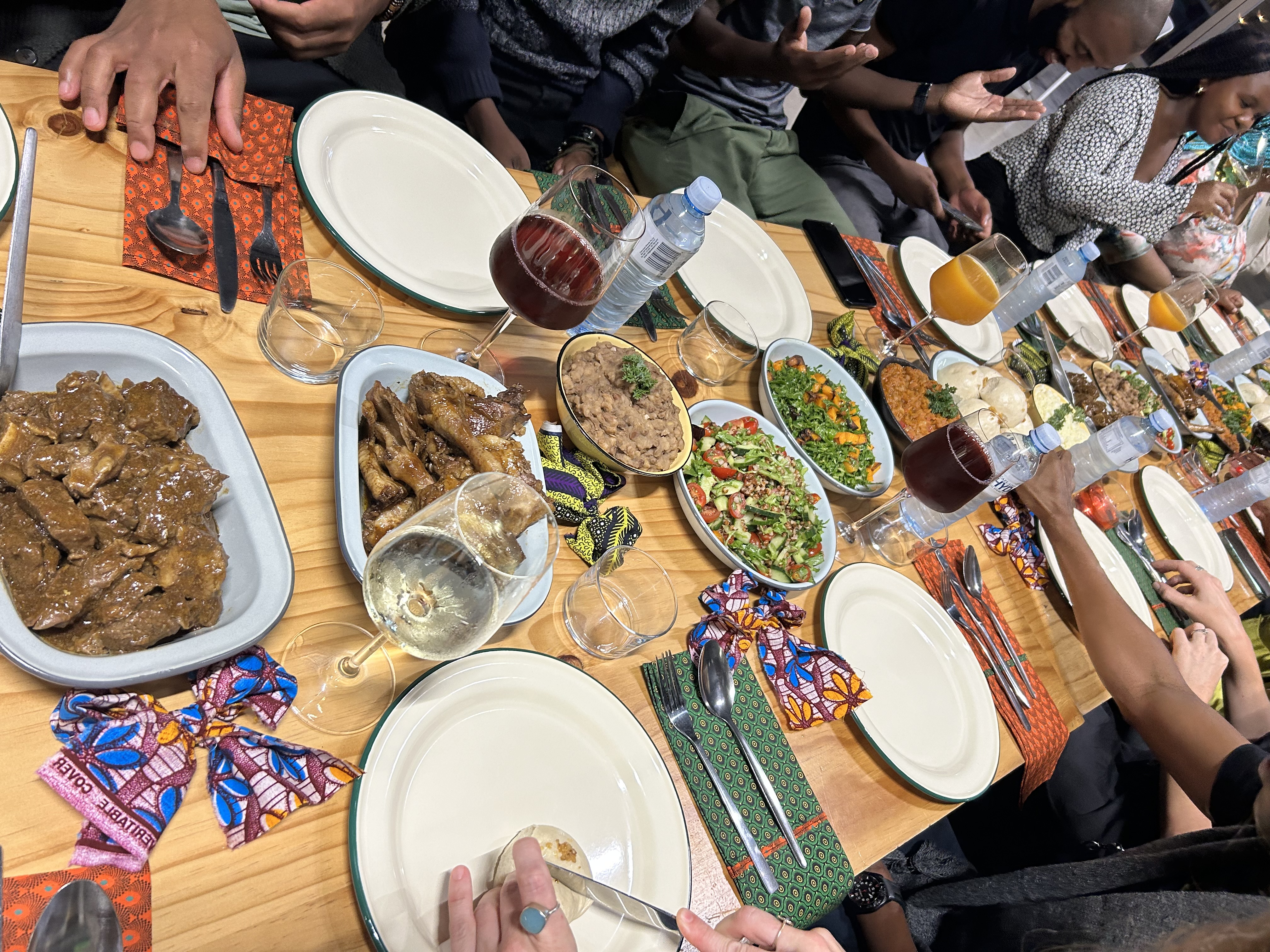 Farmer tending vegetables inside a greenhouse